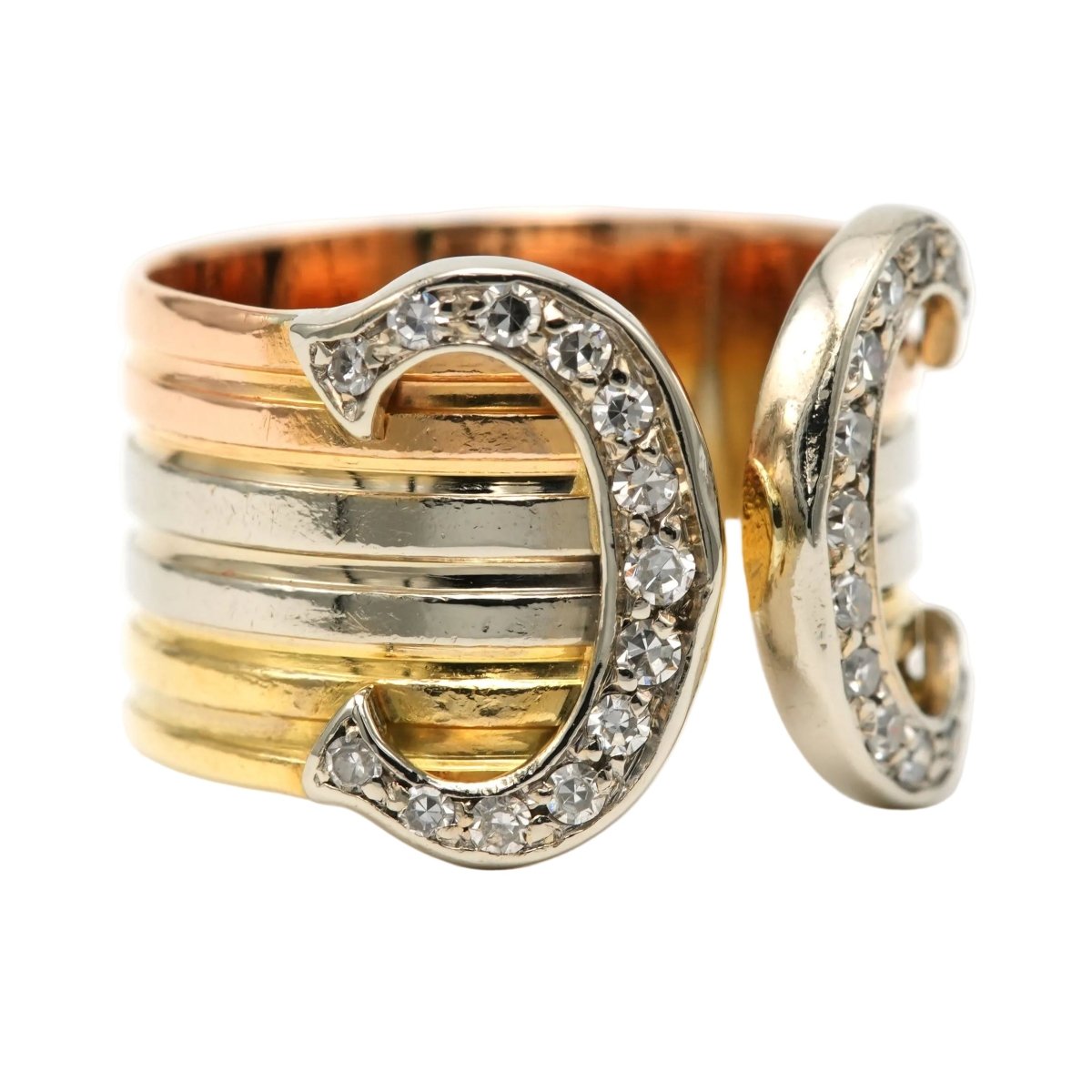 Bague CARTIER "Double C" en or blanc, or jaune, or rose et diamants - Castafiore