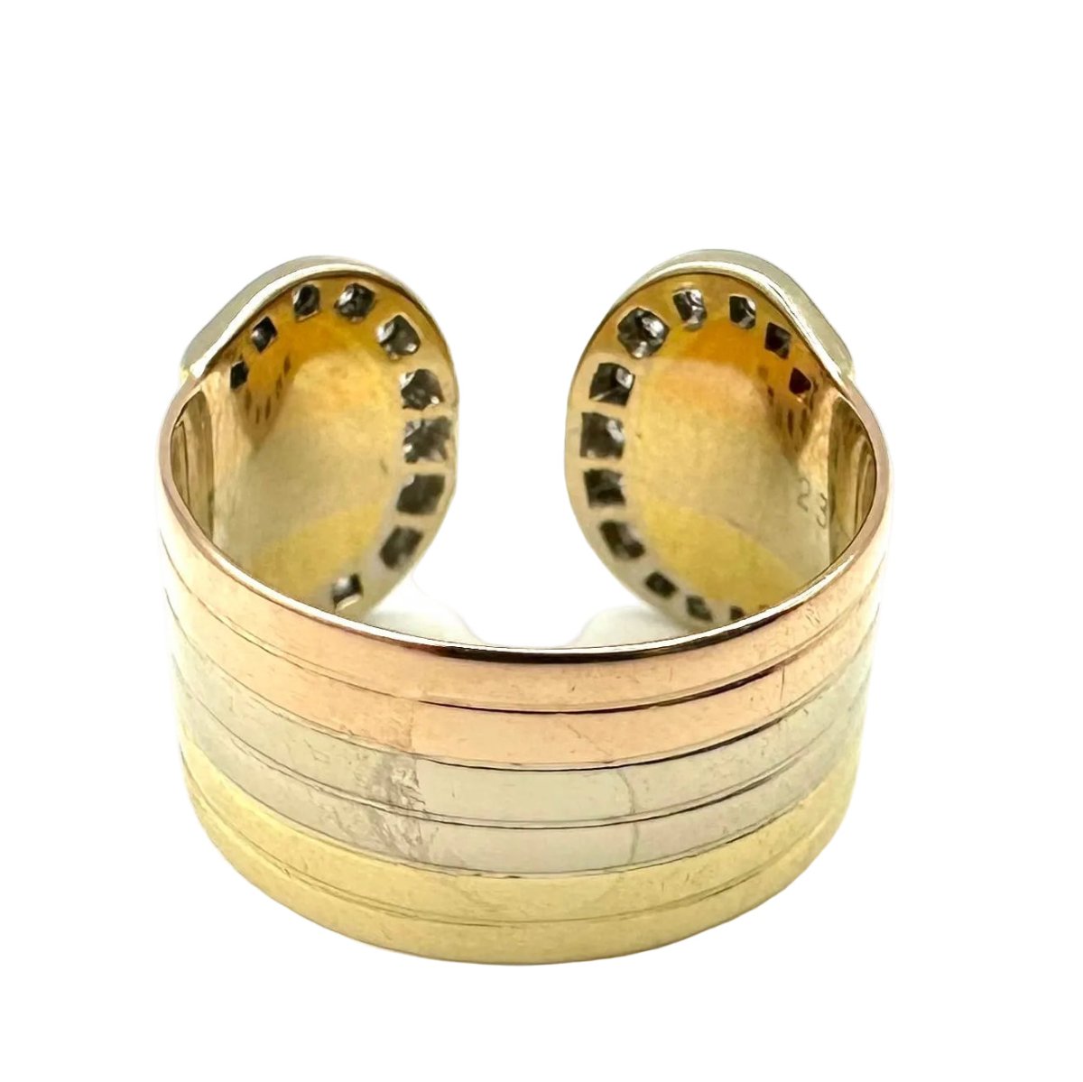 Bague CARTIER "Double C" en or blanc, or jaune, or rose et diamants - Castafiore