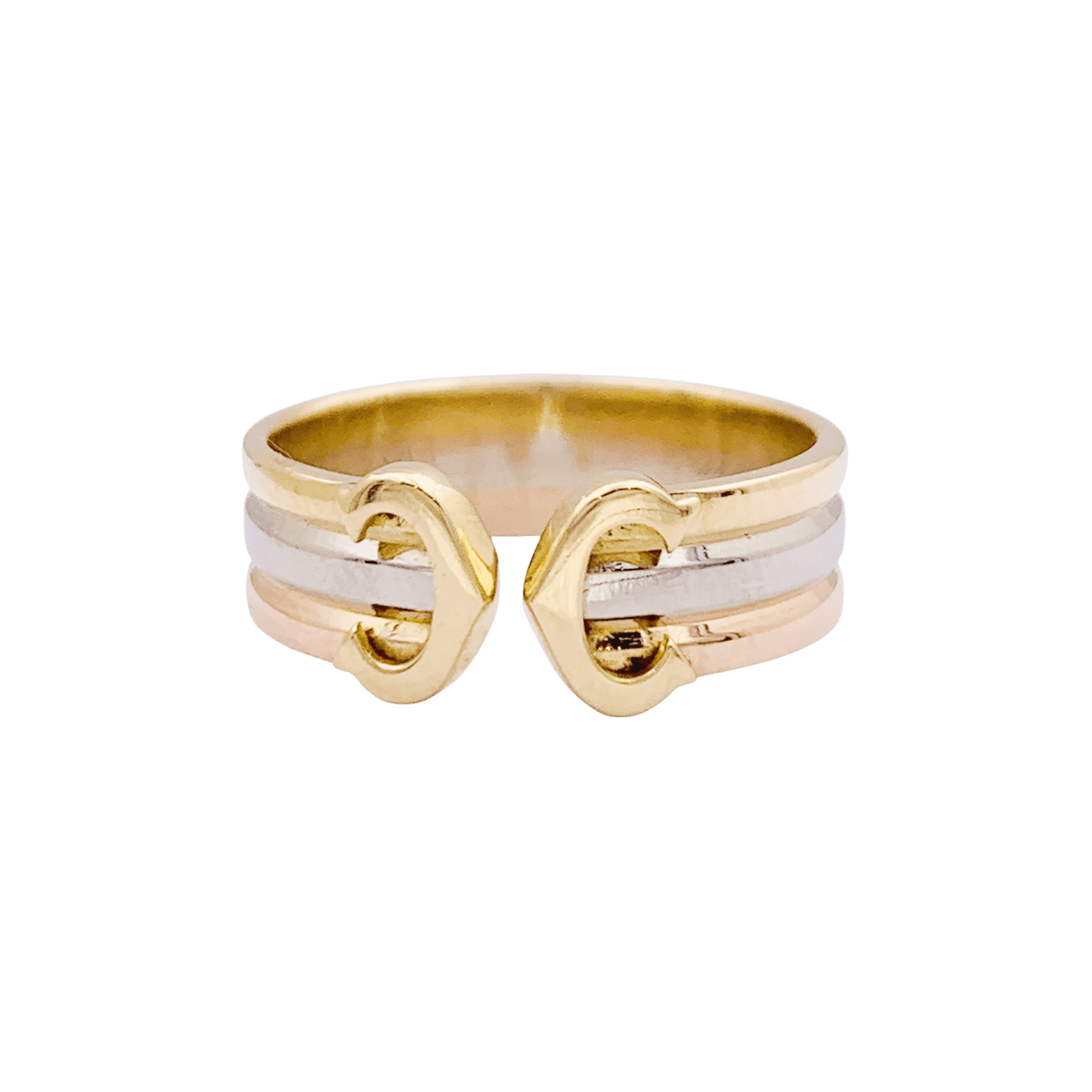 Bague CARTIER "Double C" en or jaune, or blanc et or rose - Castafiore