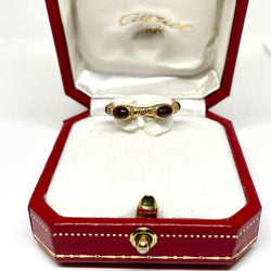 Bague CARTIER en or jaune, rubis et diamants - Castafiore