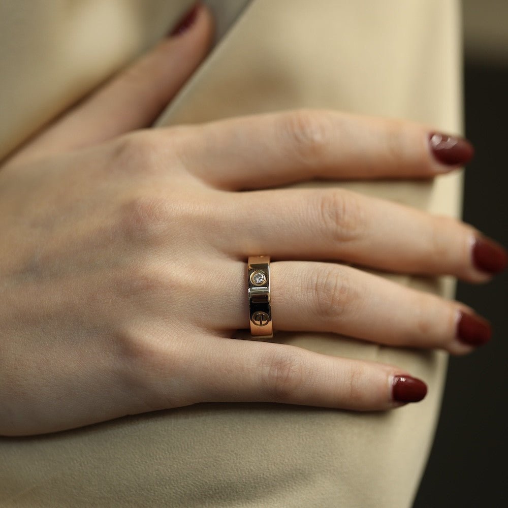 Bague CARTIER "Love" en or rose avec trois diamants - Castafiore