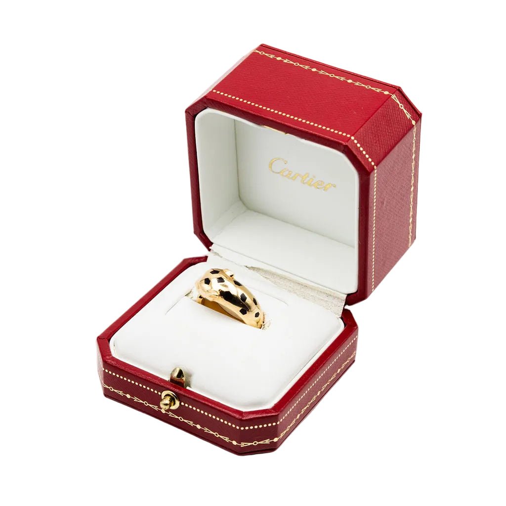 Bague CARTIER "Panthère" en or jaune, grenats tsavorites, onyx et laque noire - Castafiore