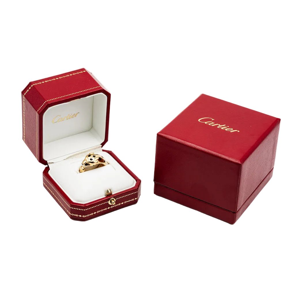 Bague CARTIER "Panthère" en or jaune, grenats tsavorites, onyx et laque noire - Castafiore