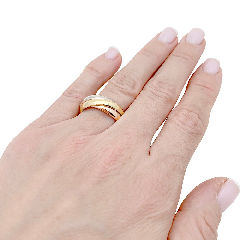 Bague Cartier, "Trinity Classique", trois ors. - Castafiore