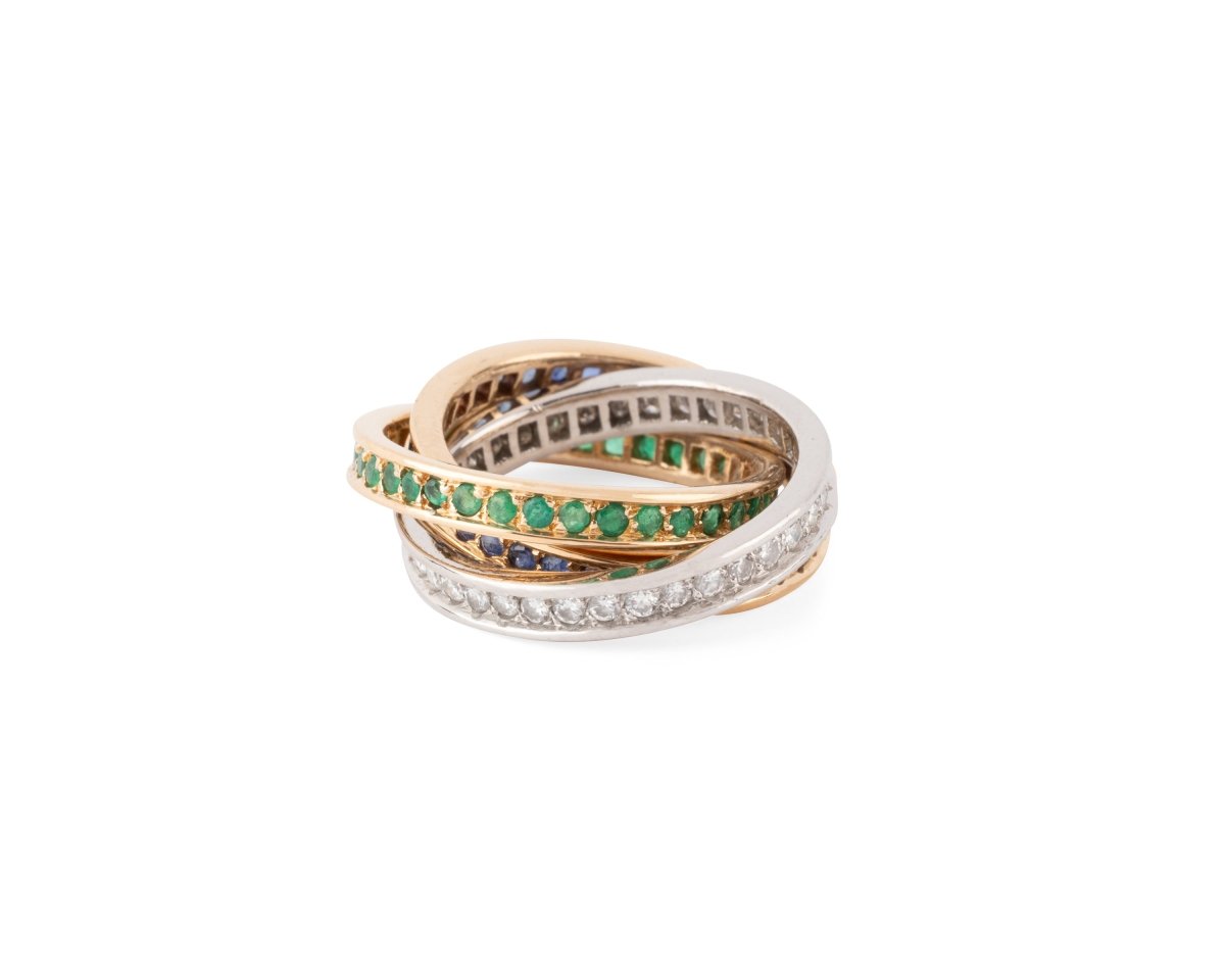 Bague CARTIER "Trinity" en or jaune, émeraudes, saphirs et diamants - Castafiore