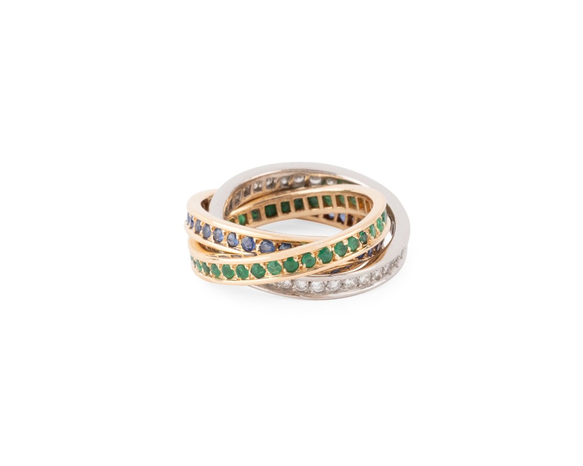 Bague CARTIER "Trinity" en or jaune, émeraudes, saphirs et diamants - Castafiore