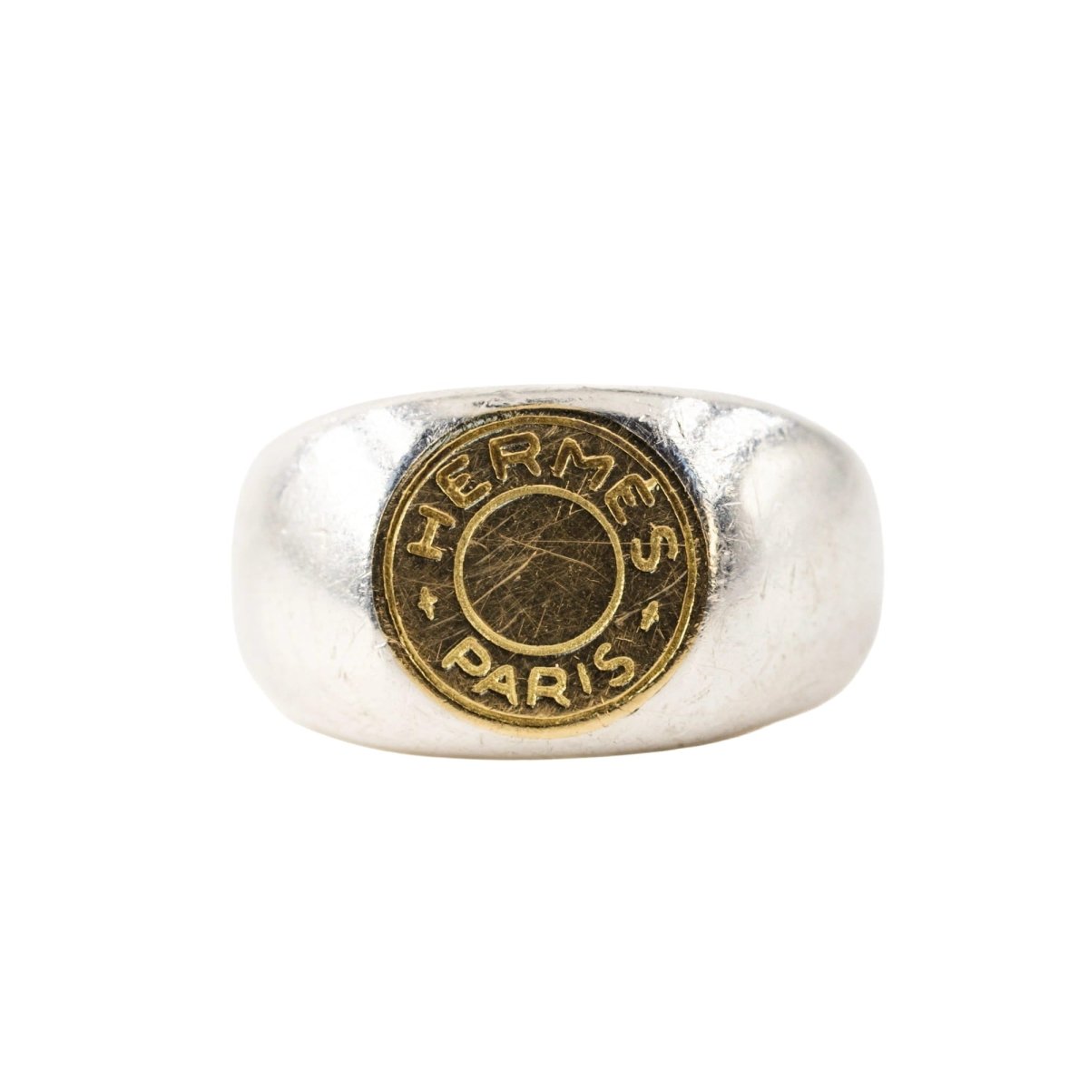 Bague Chevalière HERMÈS "Clou de selle" en argent et or jaune - Castafiore