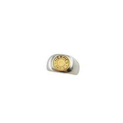 Bague Chevalière HERMÈS "Clou de selle" en argent et or jaune - Castafiore