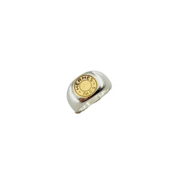 Bague Chevalière HERMÈS "Clou de selle" en argent et or jaune - Castafiore
