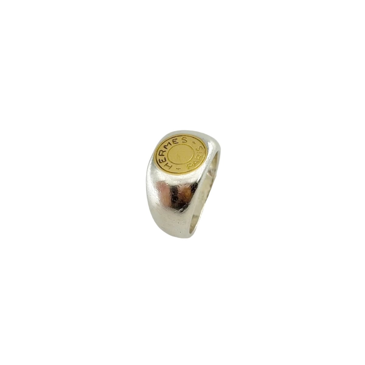 Bague Chevalière HERMÈS "Clou de selle" en argent et or jaune - Castafiore