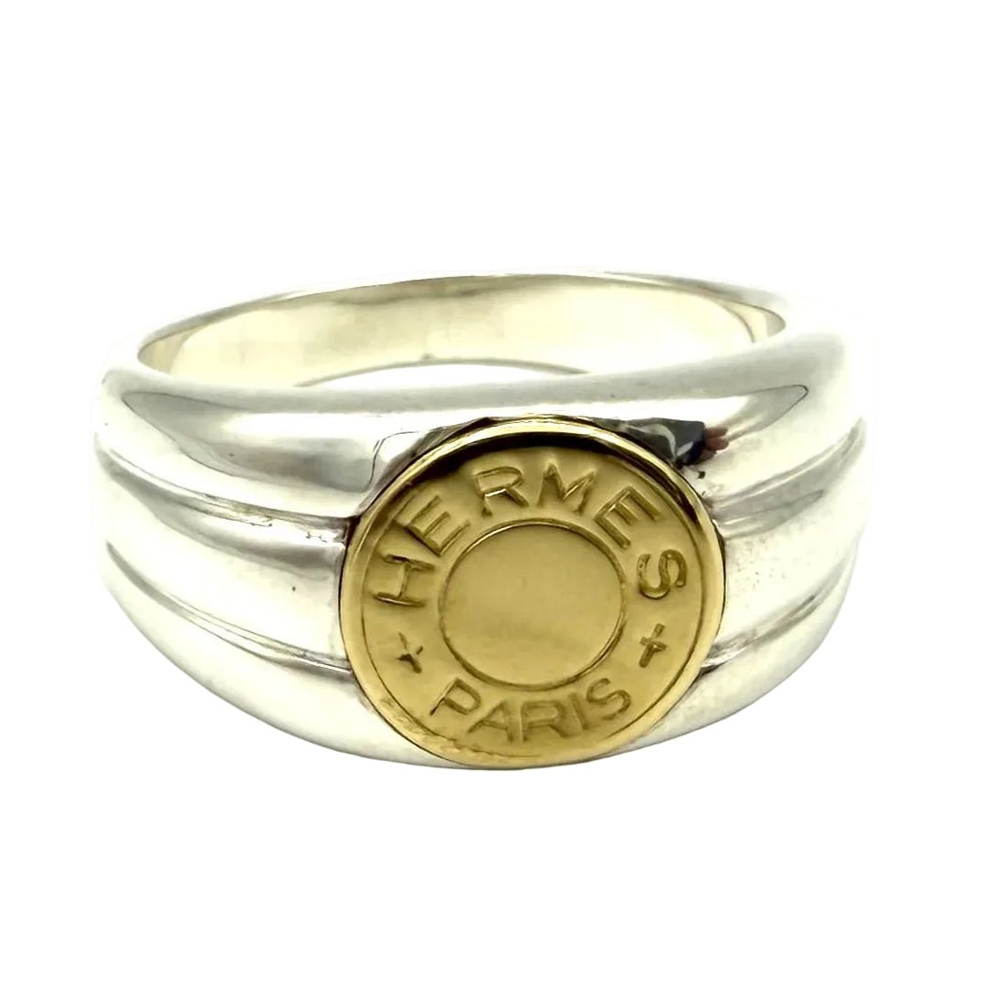 Bague Chevalière HERMÈS "Clou de selle" en or jaune et argent - Castafiore