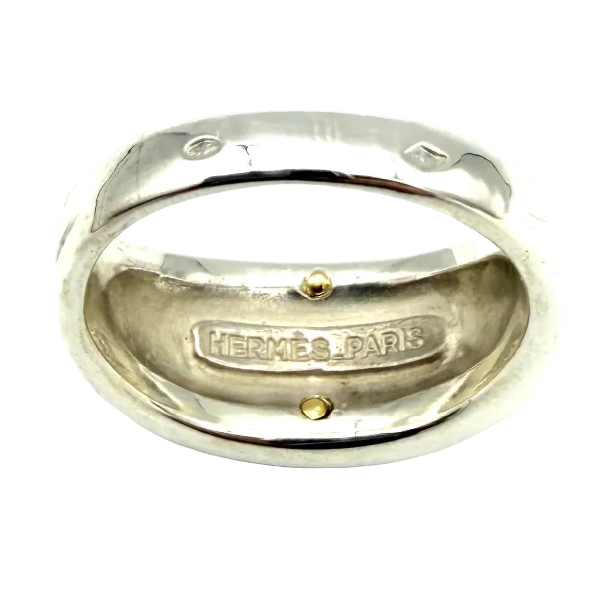 Bague Chevalière HERMÈS "Clou de selle" en or jaune et argent - Castafiore