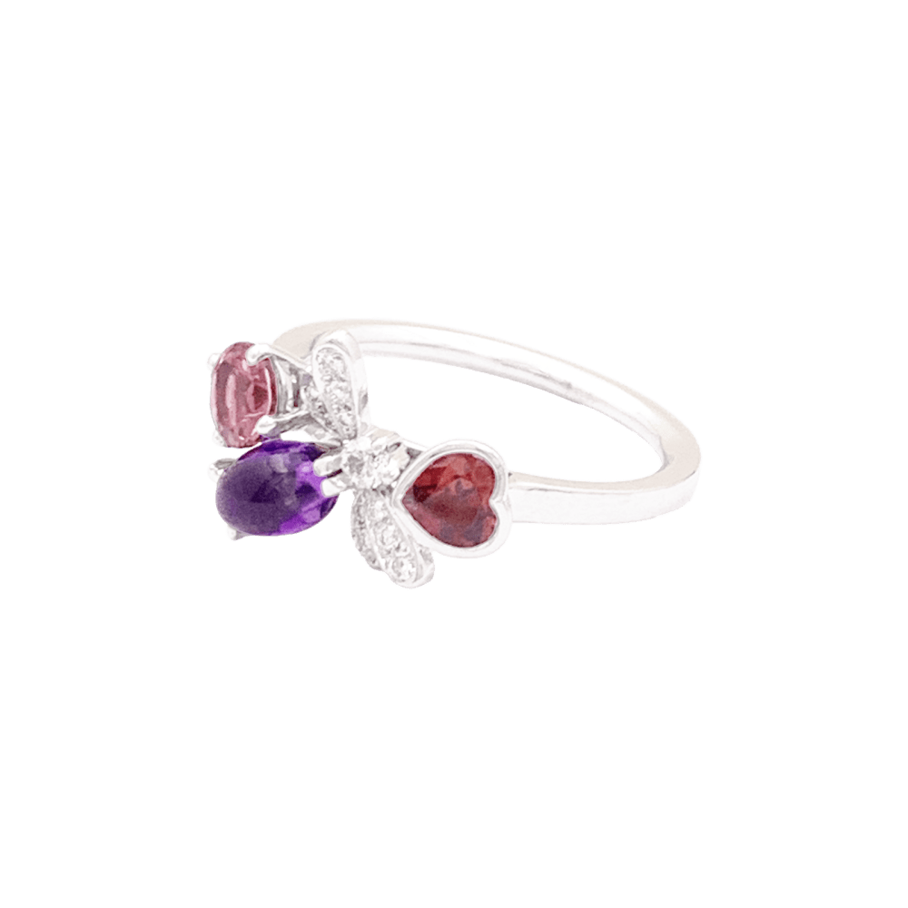 Bague Cocktail CHAUMET "Attrape - moi si tu m'aimes" en or blanc, améthyste, tourmaline, grenat et diamants - Castafiore