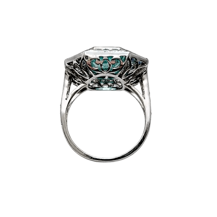 Bague Cocktail en or blanc, émeraude, saphirs et diamants - Castafiore