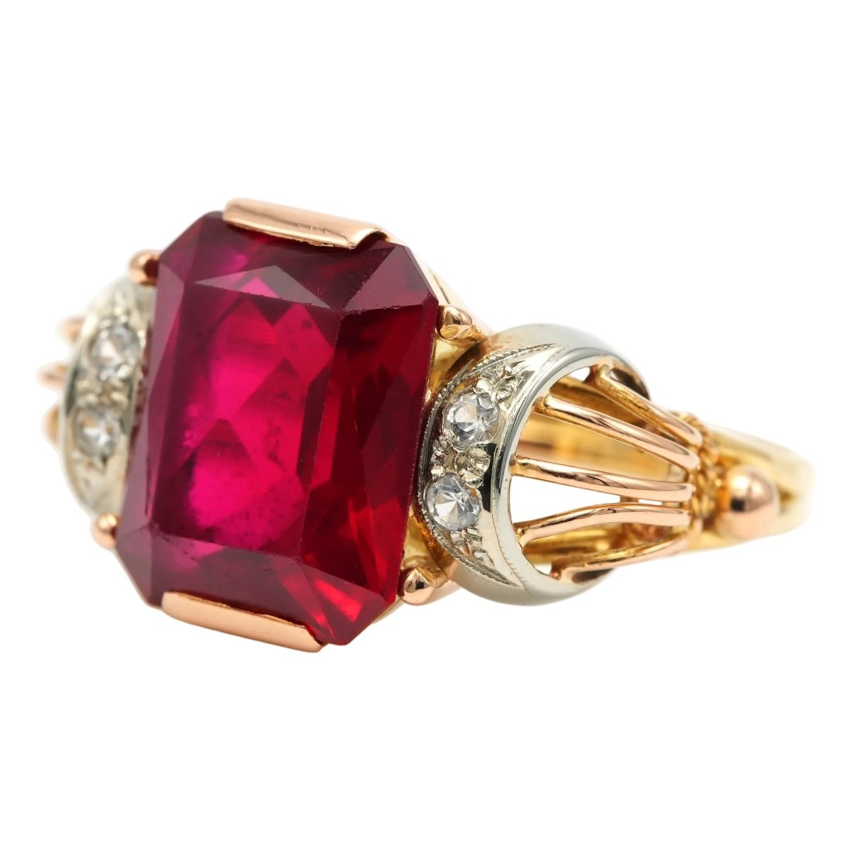 Bague Cocktail en or blanc, or jaune, rubis et saphirs - Castafiore