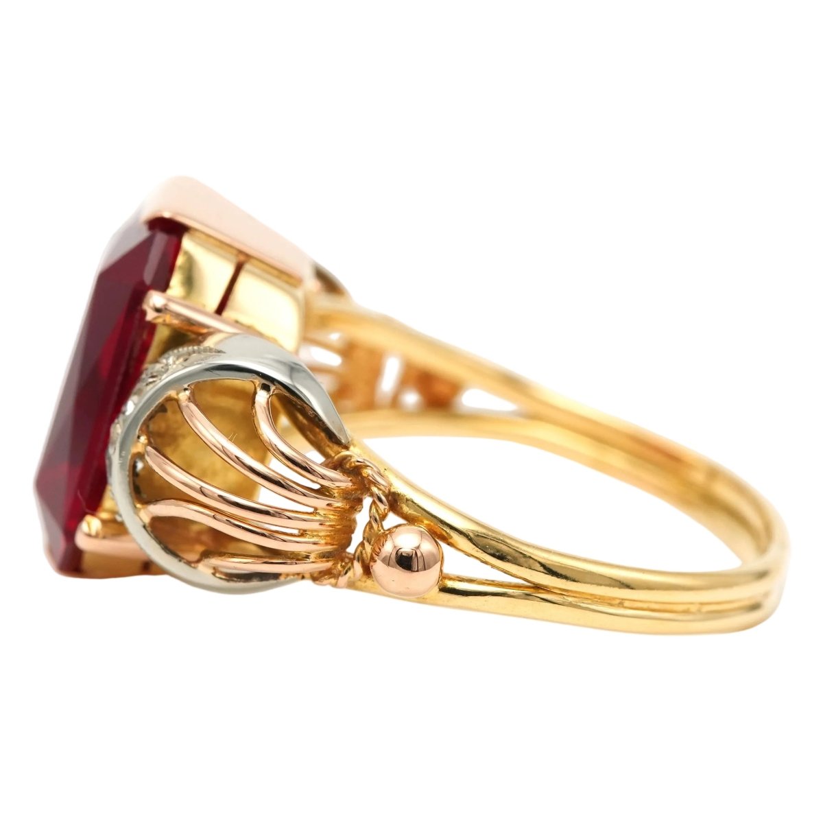 Bague Cocktail en or blanc, or jaune, rubis et saphirs - Castafiore