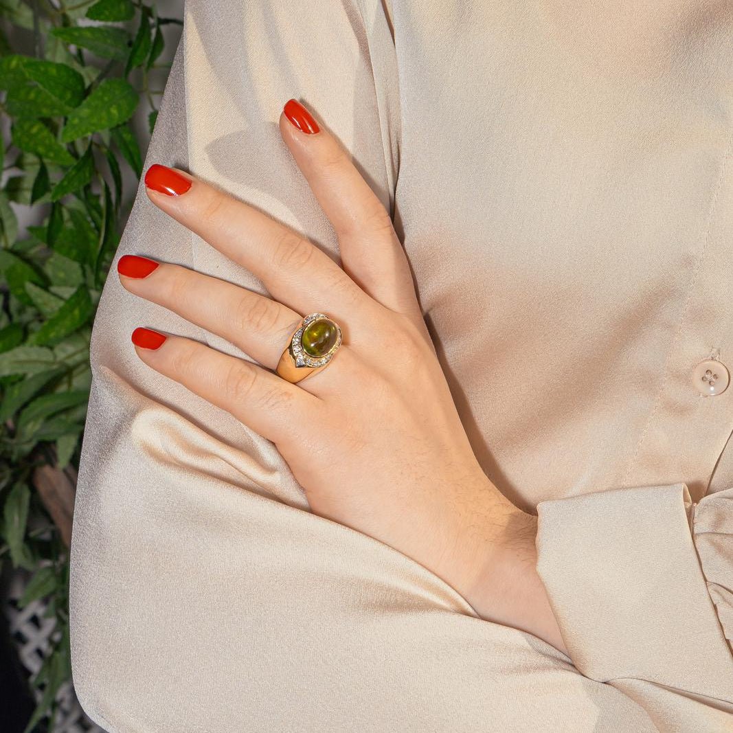 Bague Cocktail en or jaune, péridot et diamants - Castafiore