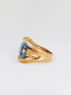 Bague cocktail vintage en or et pierre bleue - Castafiore
