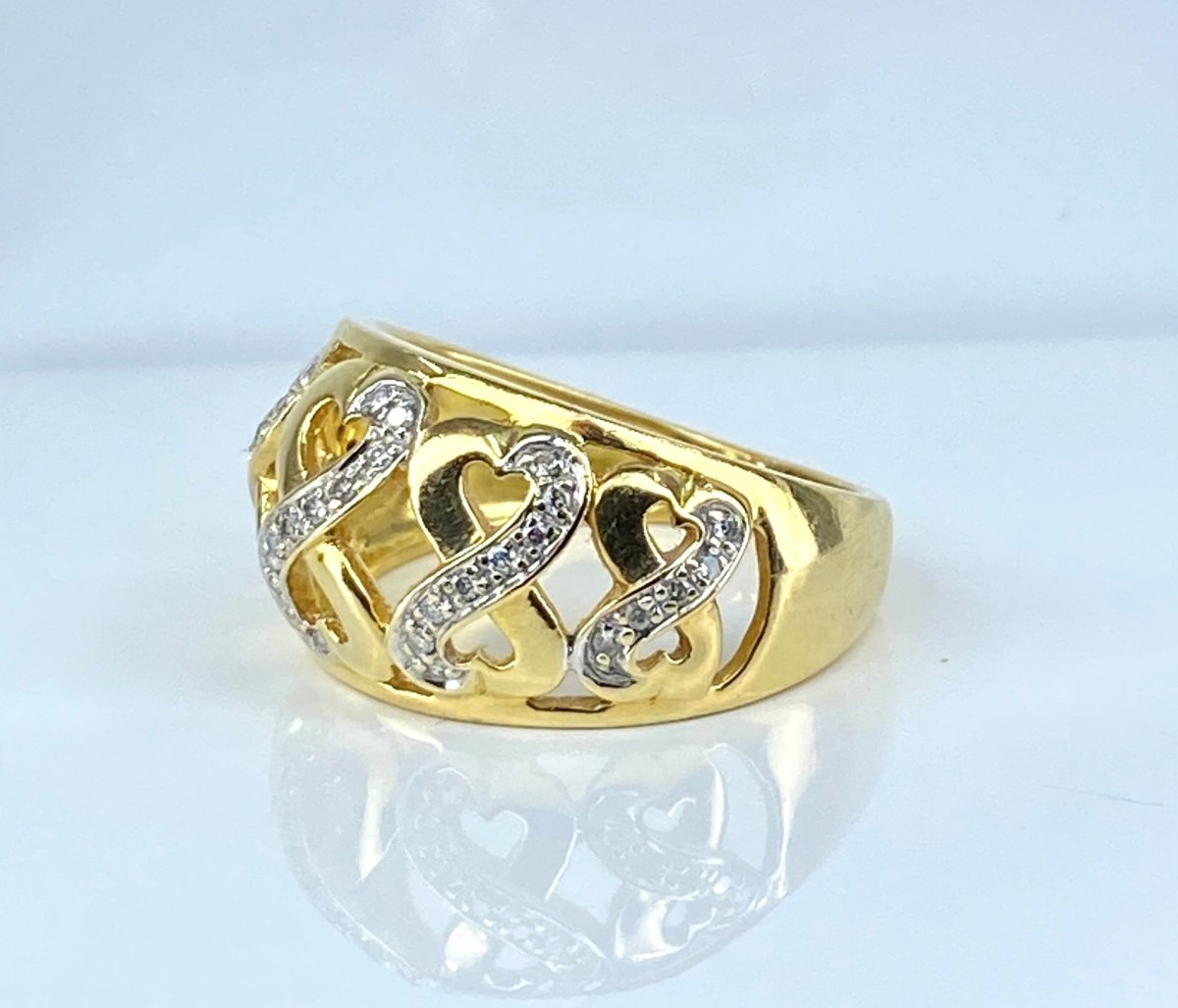 Bague "Coeurs" en or jaune et diamants - Castafiore