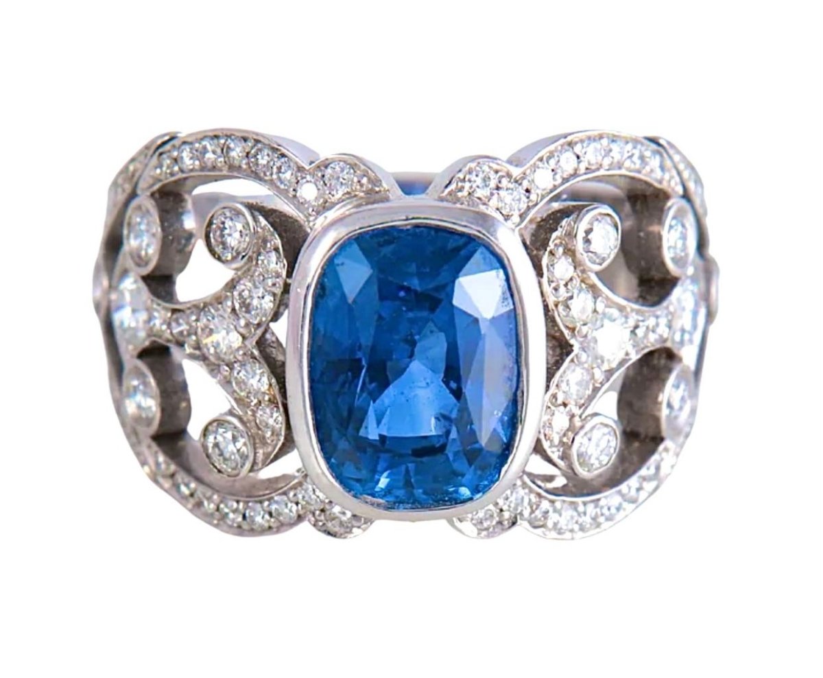 Bague coktail en or 18 carats de forme bandeau en saphir et diamants - Castafiore