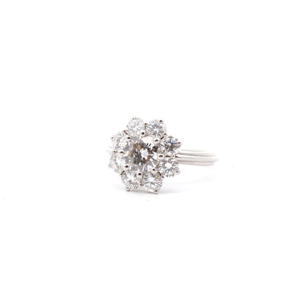 Bague de fiançailles marguerite en platine diamants - Castafiore