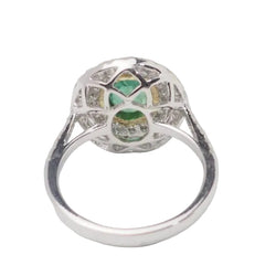 Bague double entourage en or bicolore, émeraude ovale et diamants - Castafiore