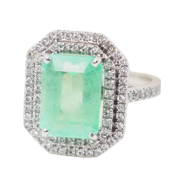 Bague double entourage en or blanc, émeraude de colombie certifiée et diamants - Castafiore