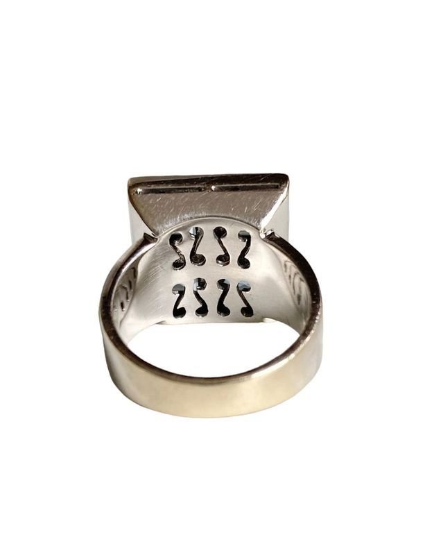 Bague en or blanc de forme carrée, sertie de quatre aigue - marine et diamants - Castafiore