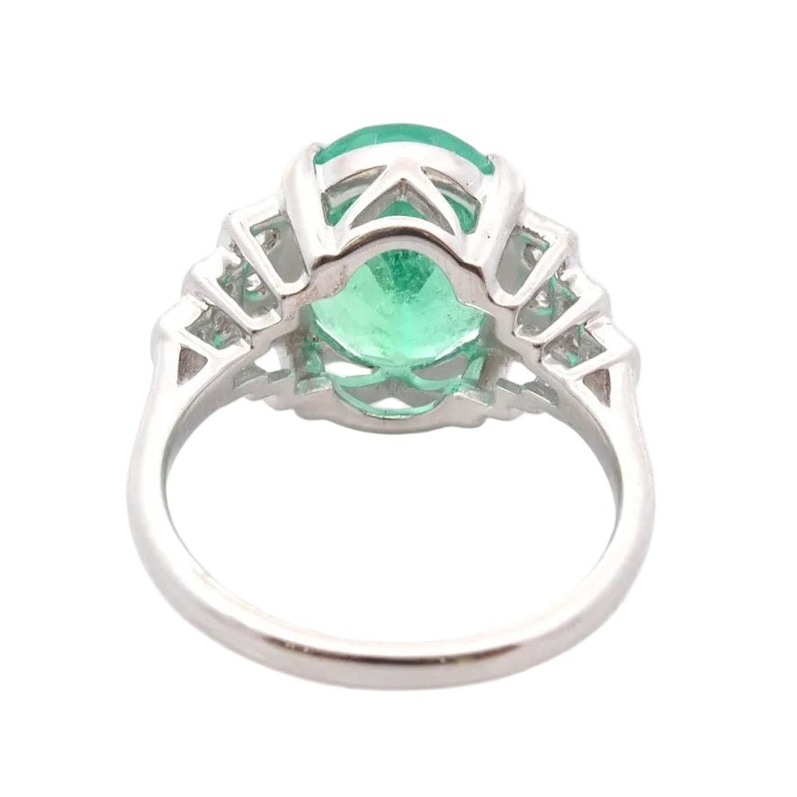Ring emerald 3.51cts and diamonds in 18k gold