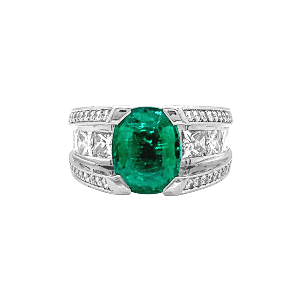 Ring white gold, emerald and diamonds.