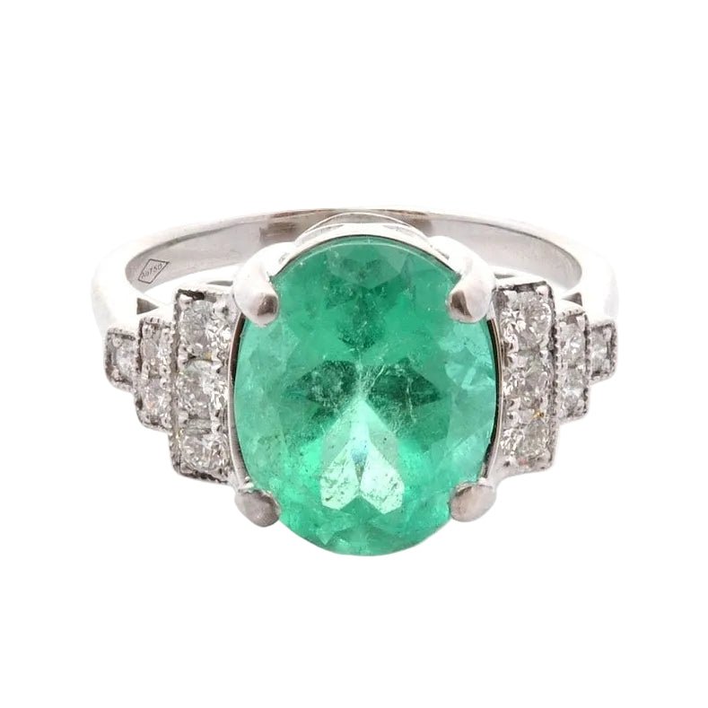 Ring emerald 3.51cts and diamonds in 18k gold