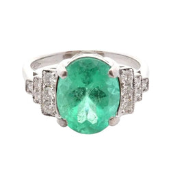 Ring emerald 3.51cts and diamonds in 18k gold