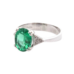Ring emerald and diamonds in 18k gold