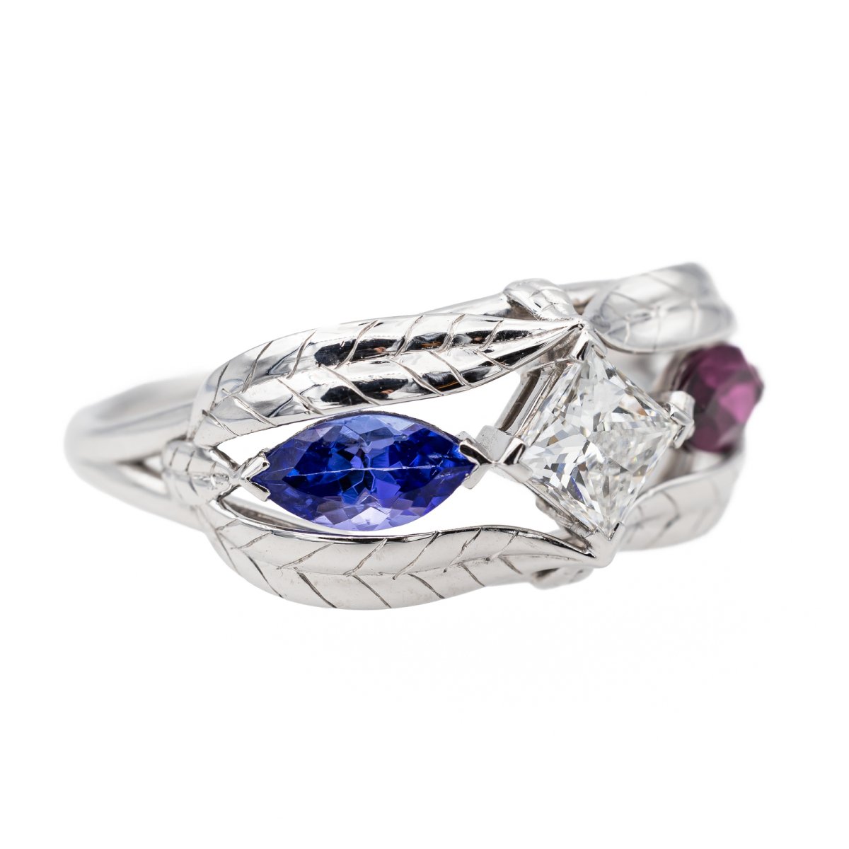 Bague en or blanc, tanzanite, grenat et diamant - Castafiore