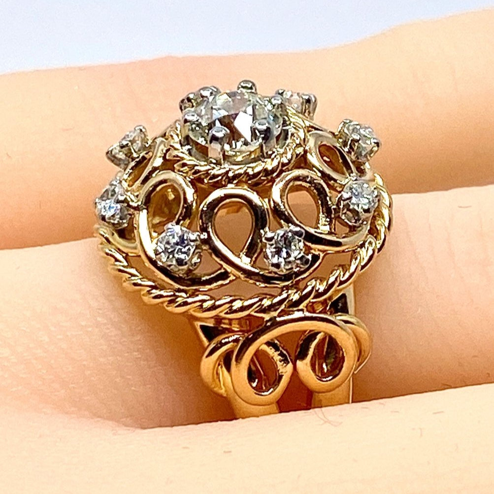 Bague en or jaune 18 carats, diamant central :0,70 carat et 8 diamants - Castafiore