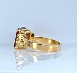 Bague en or jaune 18 carats , grenat et diamants - Castafiore