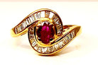 Bague en or jaune 18 carats, rubis et diamants baguettes - Castafiore