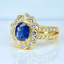 Bague en or jaune 18 carats, saphir et diamants - Castafiore