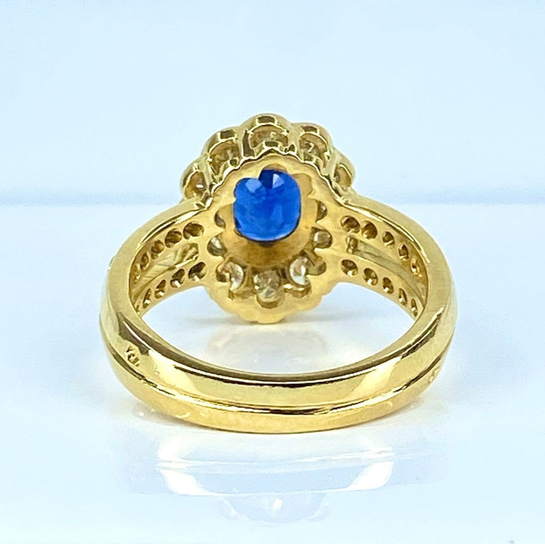 Bague en or jaune 18 carats, saphir et diamants - Castafiore