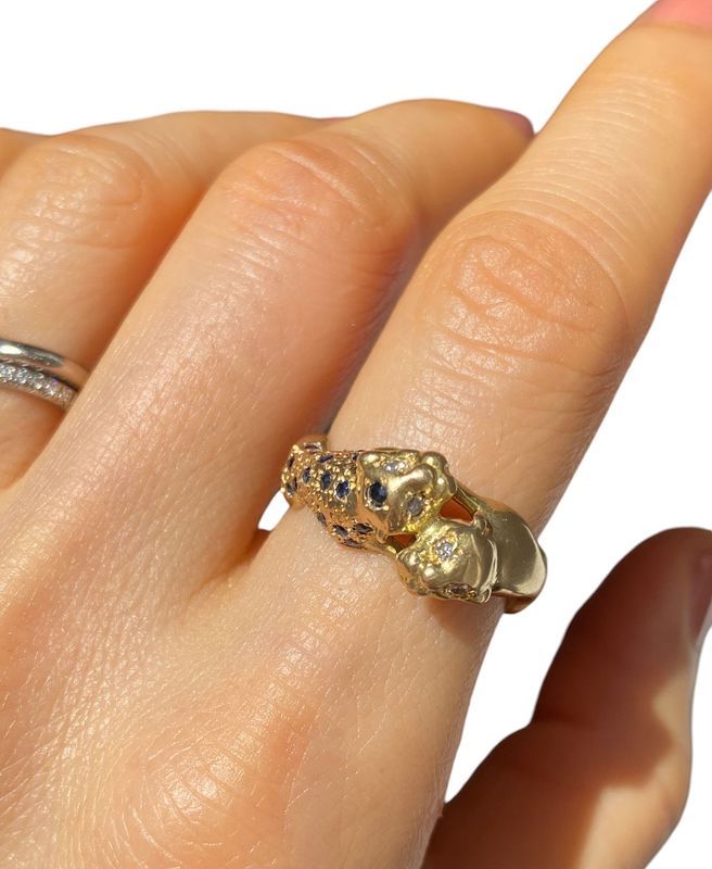 Bague en or jaune 18k représentant l'union de deux panthères - Castafiore
