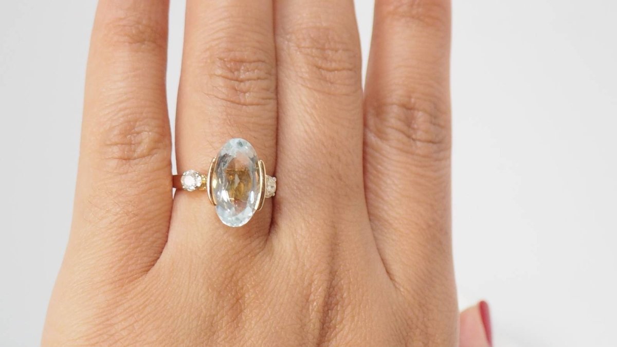 Bague en or jaune, aigue marine et diamants - Castafiore