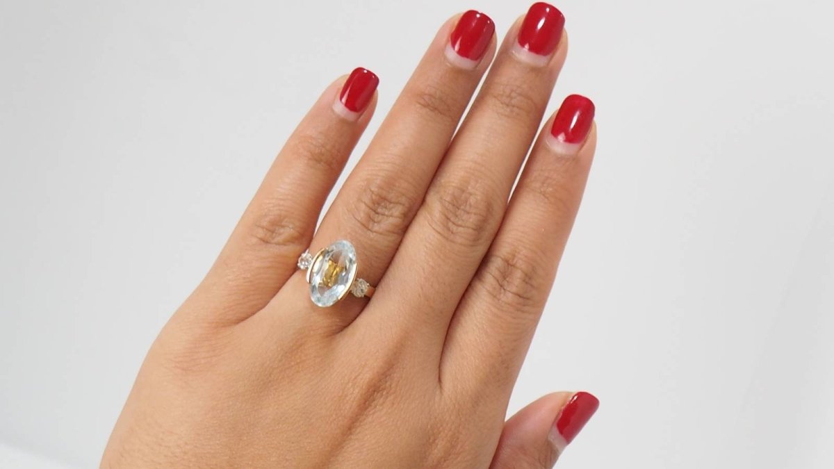 Bague en or jaune, aigue marine et diamants - Castafiore