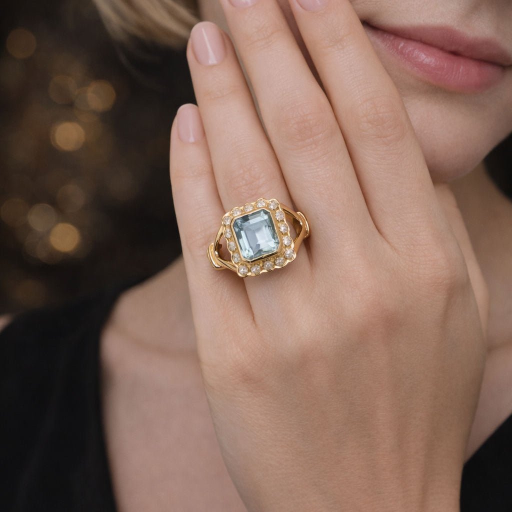 Bague en or jaune, aigue - marine, et diamants - Castafiore
