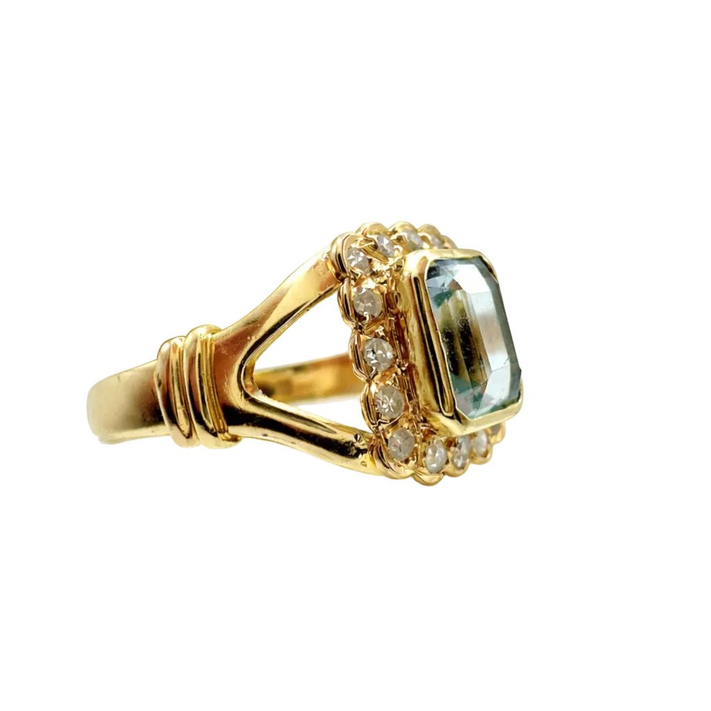 Bague en or jaune, aigue - marine, et diamants - Castafiore