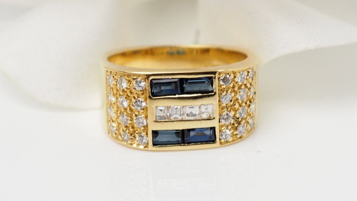 Bague en or jaune, diamants et saphirs - Castafiore