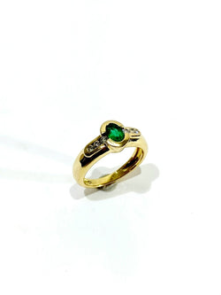 Bague en or jaune, émeraude et diamants - Castafiore