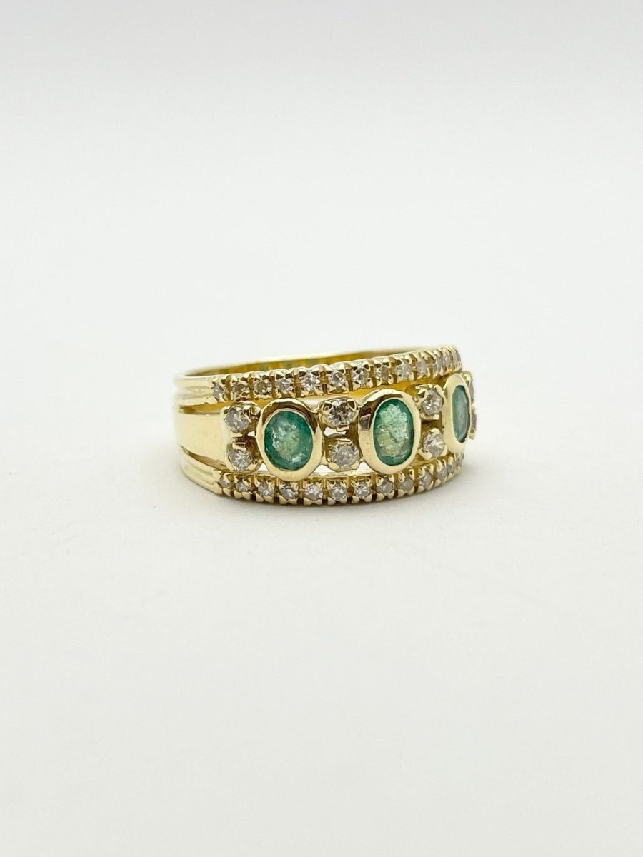 Bague en or jaune, émeraudes et diamants - Castafiore