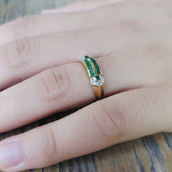 Bague en or jaune, émeraudes et diamants - Castafiore