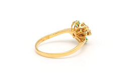 Bague en or jaune, émeraudes et diamants - Castafiore