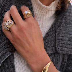 Bague en or jaune en forme de plume ornée d'un solitaire - Castafiore